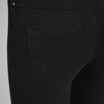 color=Black, Rear detail of black, 4-way stretch, relaxed boyfriend denim jean legging