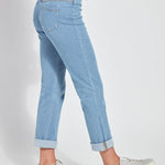 color=Bleached Blue, Side view of bleached blue, 4-way stretch, relaxed boyfriend denim jean legging, from waist down