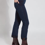 color=Indigo, Side view of indigo  4-way stretch, relaxed boyfriend denim jean legging, seen from waist down