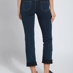 color=Indigo, Rear view of indigo,  4-way stretch, relaxed boyfriend denim jean legging, seen from waist down
