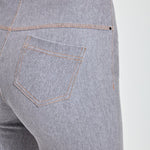 color=Uptown Grey, Rear detail view of uptown gray, 4-way stretch, relaxed boyfriend denim jean legging