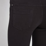 color=Black, Rear detail view of black toothpick denim jean leggings with patented concealed waistband