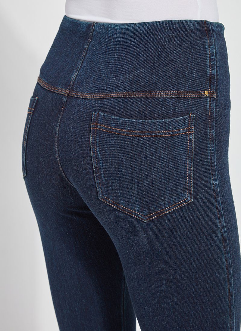 color=Indigo, Rear detail view of indigo toothpick denim jean leggings with patented concealed waistband