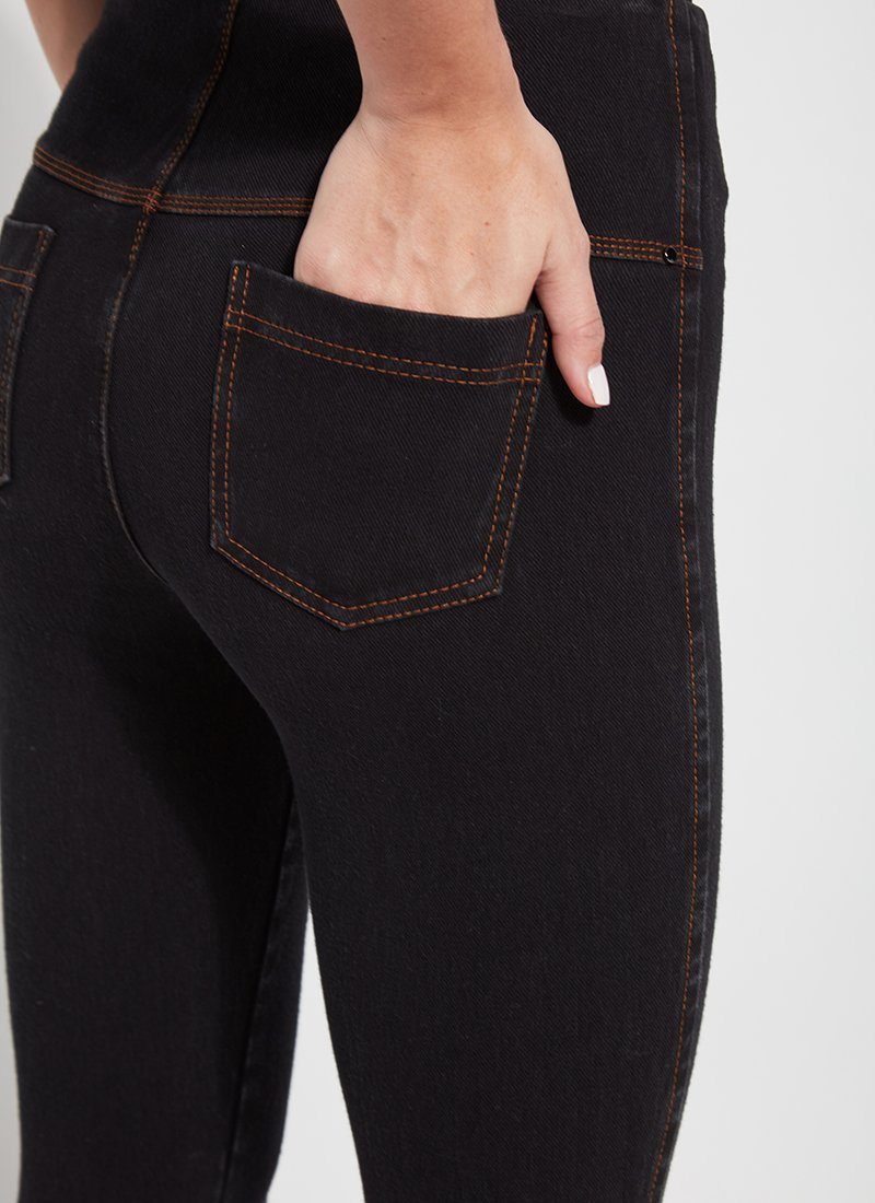 color=Midtown Black, Rear detail view of midtown black, toothpick denim jean leggings with patented concealed waistband