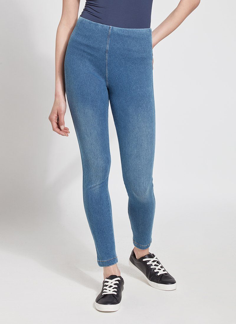 color=Mid Wash, Front view of mid wash blue, toothpick denim jean leggings with patented concealed waistband, seen from waist down