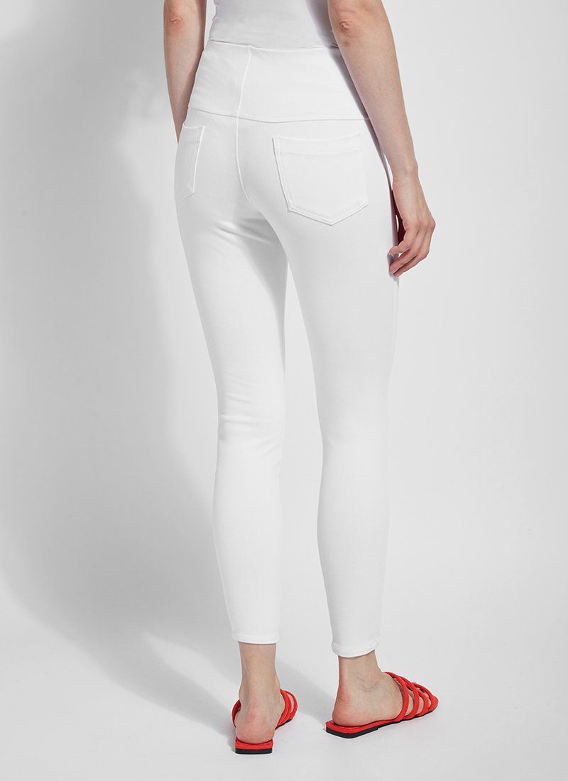 color=White, Rear view of white toothpick denim jean leggings with patented concealed waistband, seen from waist down