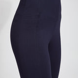 color=Midnight, Front angled detail view of midnight blue ponte laura legging with patented concealed waistband