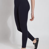 color=Midnight, angled front view, stretch cotton leggings, yoga pants, with smoothing comfort waistband and lifting, contouring seaming