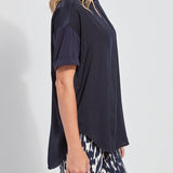 color=True Navy, side view, oversized flowy women’s shirt in stretchy knit jersey, rounded hem and drop shoulder sleeves