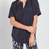 color=True Navy, front view, oversized flowy women’s shirt in stretchy knit jersey, rounded hem and drop shoulder sleeves