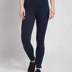 color=Indigo, Front view indigo denim skinny jean legging with concealing waistband
