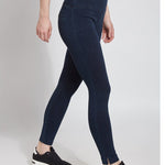 color=Indigo, Side view of indigo denim skinny jean legging with concealing waistband