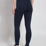 color=Indigo, Rear view indigo denim skinny jean legging with concealing waistband, seen from waist down