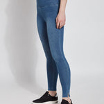 color=Mid Wash, angled front view of denim skinny jean legging with concealing waistband, seen from waist down