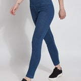 color=Mid Wash, Walking shot of mid wash colored cotton and spandex denim leggings with concealed signature waistband, from the waist down