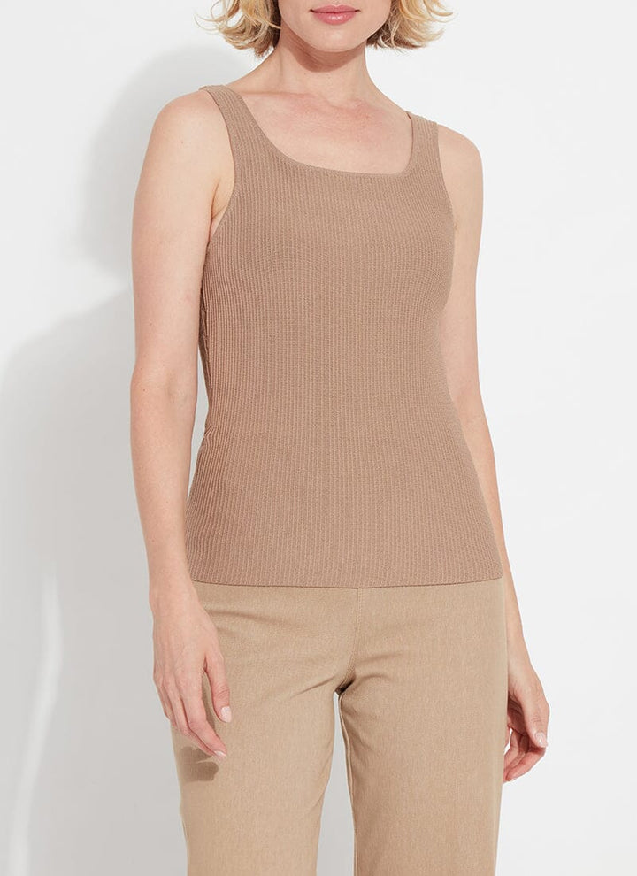 a woman wearing a brown tank top