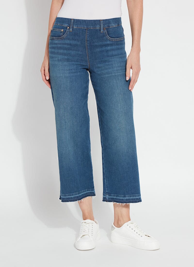 a person wearing blue jeans