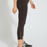 color=Black, side view, cropped denim jean leggings with zipper detail at hem and comfort waistband