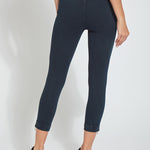 color=Indigo, back view, cropped denim jean leggings with zipper detail at hem and comfort waistband