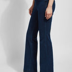 color=Indigo, side view, women's denim pant made from versatile stretch denim, has a concealed slimming waistband