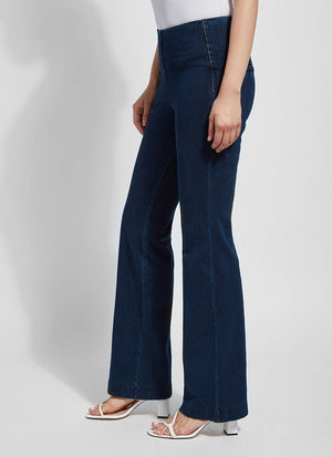 color=Indigo, side view, women's denim pant made from versatile stretch denim, has a concealed slimming waistband