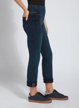 color=Indigo, side view, plus size boyfriend cut denim leggings with comfort waistband to smooth and slim 