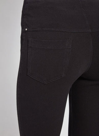 color=Black, Rear detail view of black  toothpick denim jean leggings with patented concealed waistband
