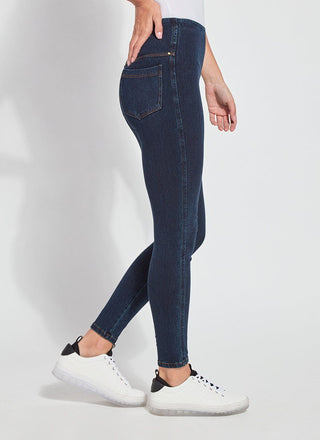 color=Indigo, Side view of indigo  toothpick denim jean leggings with patented concealed waistband, seen from waist down