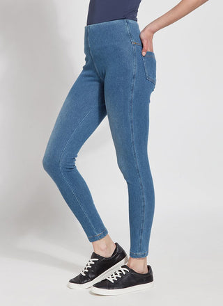 color=Mid Wash, Side view of mid wash blue,  toothpick denim jean leggings with patented concealed waistband, seen from waist down
