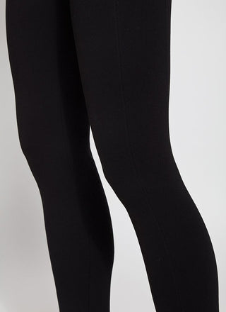 color=Black, Detail view of black ponte laura legging with patented concealed waistband, seen from thighs to calves 
