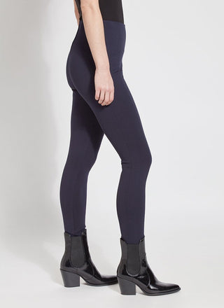 color=Midnight, Side view of midnight blue ponte laura legging with patented concealed waistband, seen from waist down