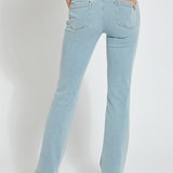 color=Bleached Blue, back view, knit denim jean leggings with deep side pocket, skims hips and thighs and opens into bootcut hem