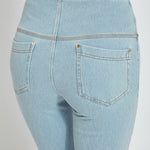 color=Bleached Blue, back detail, knit denim jean leggings with deep side pocket, skims hips and thighs and opens into bootcut hem