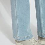 color=Bleached Blue, hem detail, knit denim jean leggings with deep side pocket, skims hips and thighs and opens into bootcut hem