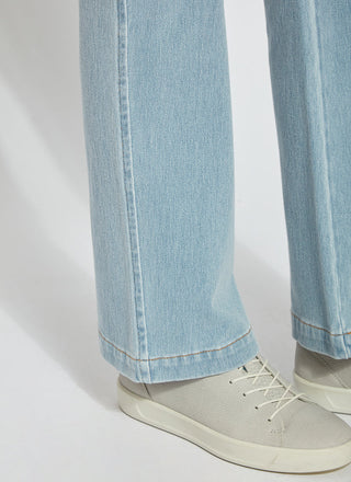 color=Bleached Blue, hem detail, knit denim jean leggings with deep side pocket, skims hips and thighs and opens into bootcut hem