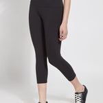 color=Black, Angled front view of black flattering cotton crop leggings with concealed waistband for control and comfort