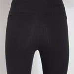 color=Black, Rear detail view of black flattering cotton crop leggings with concealed waistband for control and comfort