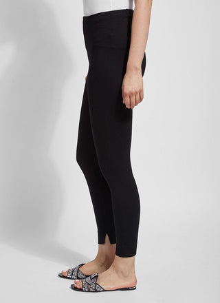 color=Black, side view, leggings with one-piece construction, ankle slits and wide hem, featuring a slimming concealed comfort waistband