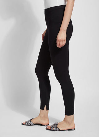 color=Black, side, leggings with one-piece construction, ankle slits and wide hem, featuring a slimming concealed comfort waistband