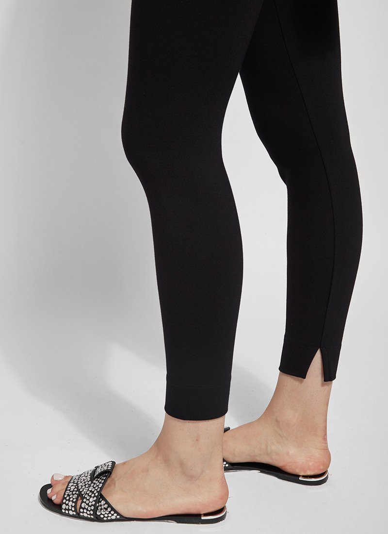 color=Black, leggings with one-piece construction, ankle slits and wide hem, featuring a slimming concealed comfort waistband