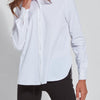 color=White, front view, slim fit women’s button up shirt with curved hem, made with wrinkle resistant microfiber