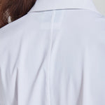 color=White, back neckline detail, slim fit women’s button up shirt with curved hem, made with wrinkle resistant microfiber