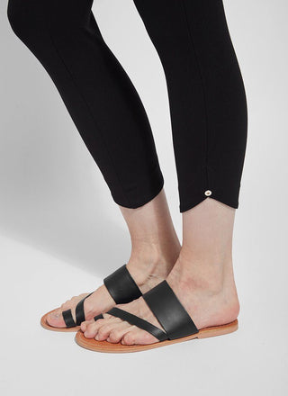 color=Black, Leg opening detail of black  ponte Jasmyne Crop Legging, petal-hem detailing with concealed patented waistband