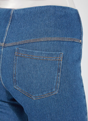 color=Mid Wash, back waistline detail, women's denim jean short, smoothing comfort waistband, body hugging in hips and looser across thigh