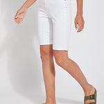 color=White, front angle, women's denim jean short, smoothing comfort waistband, body hugging in hips and looser across thigh
