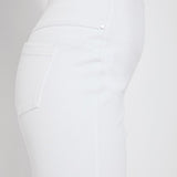 color=White, side view, women's denim jean short, smoothing comfort waistband, body hugging in hips and looser across thigh