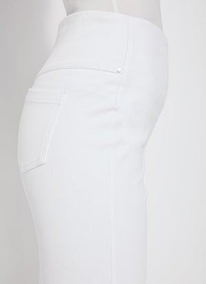 color=White, side view, women's denim jean short, smoothing comfort waistband, body hugging in hips and looser across thigh