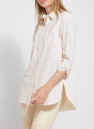 color=Eggnog, angled front view, stretch microfiber women's button up shirt with patch pockets and roll-tab sleeves