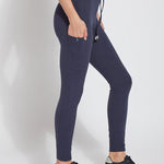 color=Eclipse Melange, side view, blue legging jogger hybrid with cotton spandex and comfortable slimming waistband 