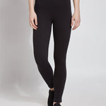 color=Black, front view, plus size denim skinny jean leggings with concealed smoothing waistband for flattering fit